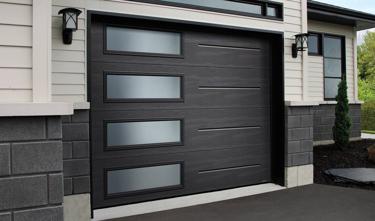 Sales, installation and repair of residential, commercial and industrial garage doors in Montreal, Laval and on the North Shore - Montreal Garage Doors - Portes de Garage Supérieur Inc. Montreal